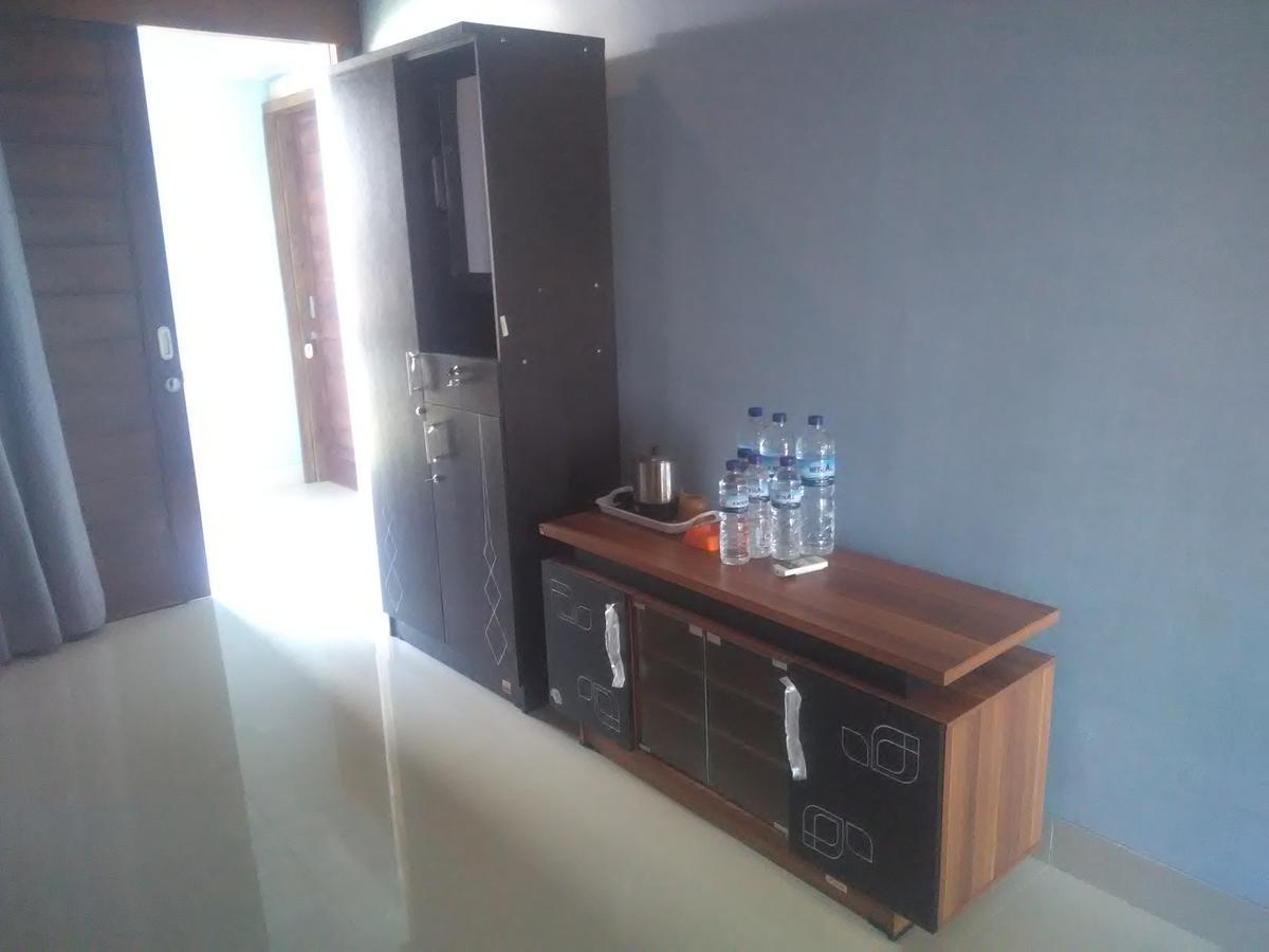 Ridho Malik Hotel Bumbang Екстериор снимка